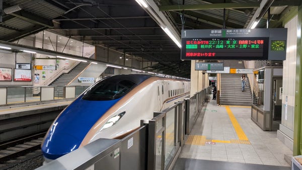 Shinkansen arriving at Sakudaira station