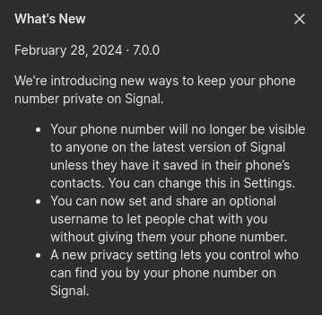 The image is a screenshot of an update notification for Signal, version 7.0, dated February 28, 2024. The text announces new privacy features: 1) Phone numbers will not be visible to others unless saved in their contacts, with an option to change this in settings. 2) Users can now set and share a username to chat with others without sharing their phone number. 3) A new privacy setting allows users to control who can find them by their phone number on Signal.
