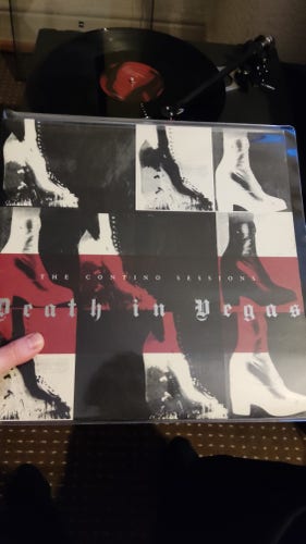 Death in Vegas vinyl cover of a boot in black and white several times over 
