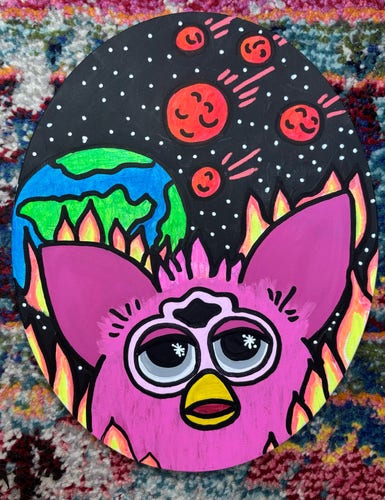 Pink furby with the world and some asteroids behind them, surrounded by flames 