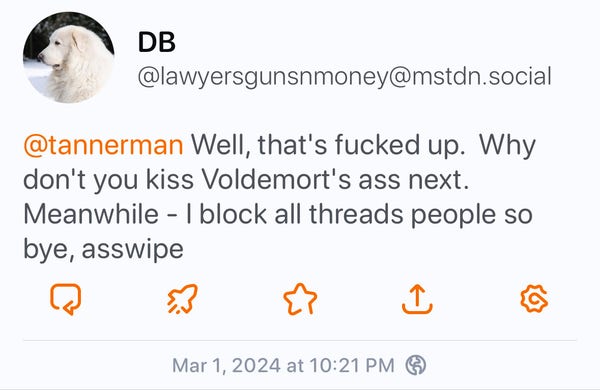 A screenshot of a social media post by a user named 'DB' with an aggressive message directed at another user, including profanity and a reference to a fictional character Voldemort. 