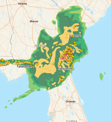 Doppler radar of a large storm over northern Florida, full of lightning strikes.