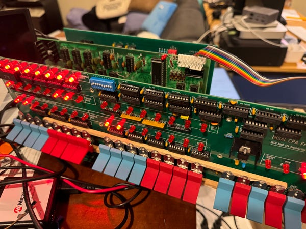 A DIY remake of the IMSAI 8080 front panel (not my design though) and a vintage Z80 card. 