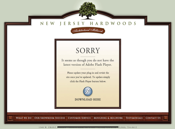 A web page for New Jersey Hardwoods saying that my browser isn't running the latest version of Adobe Flash, with a download link.