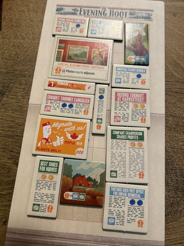 A tile laying game with news articles 
