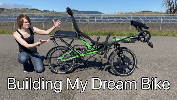 Me kneeling next to and gesturing towards my recumbent green ebike. In the background is a field of solar panels.

Below reads "Building My Dream Bike".