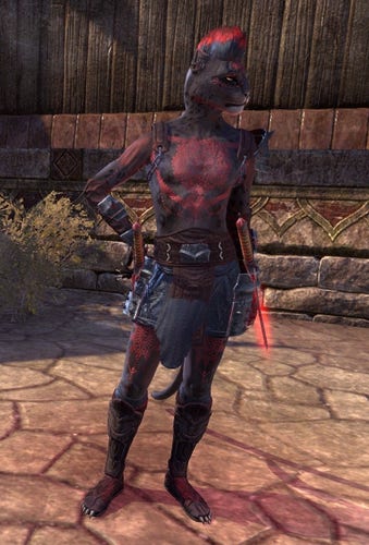 My Khajiit toon wearing the new Standing Flame hairstyle, a very tall mohawk with its upper half dyed flame-red, which matches the red body and face tattoos on his black-panther-patterned fur. He stands in the flagstone-paved courtyard of the Sleek Creek House, wearing a short dark-gray kilt with no shirt (the better to show off his tattoos), and is striking a nice sort of contrapposto pose courtesy of the Brassy Assassin animations, 