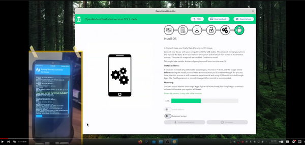 Screenshot of a youtube video displaying the install view of the openandroidinstaller in progress. On the left is a picture of the phone in the installation process.