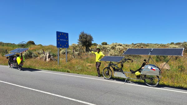 Solar bikes at Spain - Portugal border (EU logo)