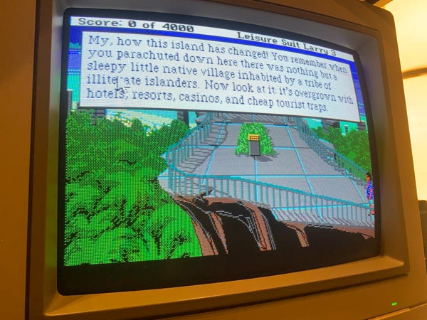 The opening scene showing Larry on a lookout point overlooking the beach and city. The game is running on my Amiga with a CRT monitor. 