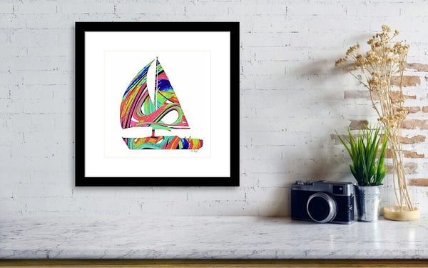 Colorful sailboat art in black frame by artist Sharon Cummings.