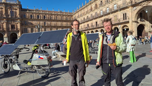 Solar bikes with their owners on Plaza Mayor in Salamanca, Spain