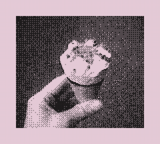 Photo of a hand holding an ice cream cone, highly pixelated