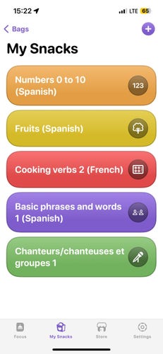 Screenshot of the My Snacks screen, showing multiple lists like „Fruits (Spanish)“ and „Cooking verbs 2 (French)“
