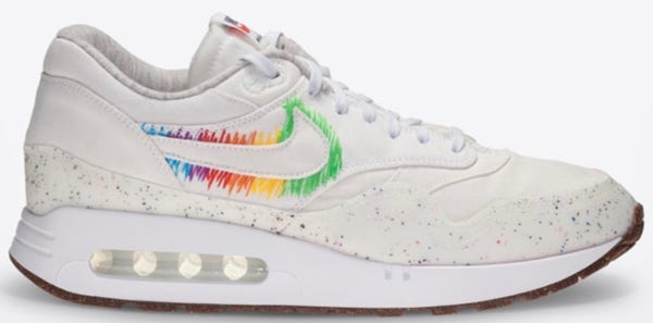 White Nike sneaker with colorful pencil lines up and down surrounding the Nike swoosh logo