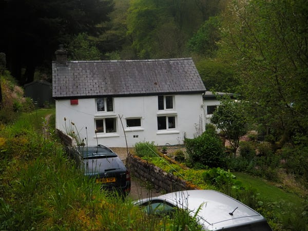 My old house in the Cych valley. Strangers' cars in the driveway, no sheep in the garden any more. In fact the whole valley has become rather gentrified since I was there, when it still had a pub and my neighbours were farmers who'd been there all their lives.