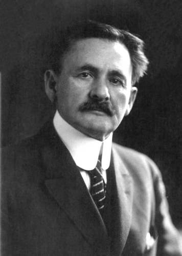 Photograph of Nobel Laureate Albert A. Michelson.

Black and white photograph featuring A.A. Michelson with a well-groomed mustache.