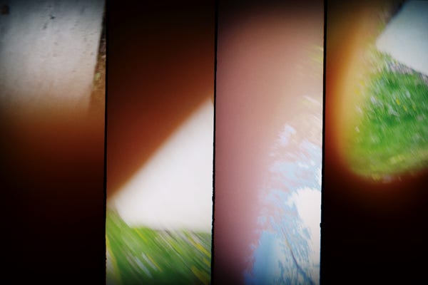 4 frames of blurry blobby color (with hints of grass + sky)