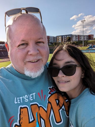 A photo I took of my beautiful wife and myself at the Truist stadium here in Winston Salem, NC as we went to the Winston Salem Hype Hens baseball game.