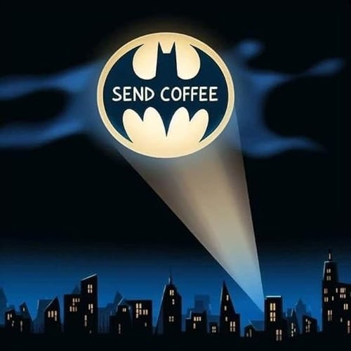 Batman's bat light shining over dark city signaling:
SEND COFFEE