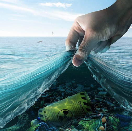 A Hand lifting the ocean to expose pollution. 
No attribution
Via Pinterest