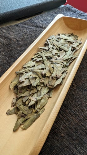 Dragonwell tea leaves, dry.