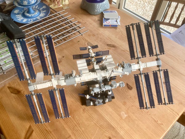 Lego model of the ISS on the table.