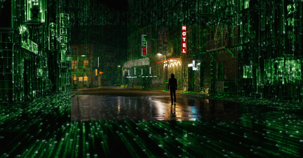 A view of the matrix code structure inset with a partial view of a city street at night it produces.