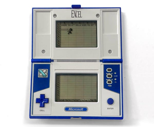 A picture of a small handheld game device that unfolds into two transflective LCD screens. It's Microsoft Excel as a Game & Watch.