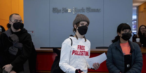 Free Palestine protestor in front of nyt offices.
