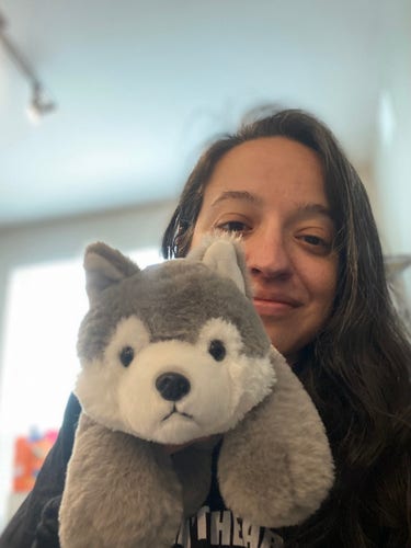 Me and the small husky plush. I’m holding it up to the camera.