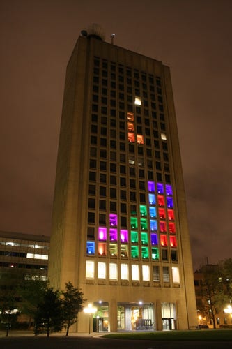 MIT building 54 displaying the various colored blocks of the game Tetris.