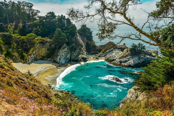 Photograph of McWay Falls in Big Sur, California, with turquoise waters and a secluded beach. Image at:  https://beautifulsunphotography.com/featured/seaside-serenity-at-mcway-falls-deb-beausoleil.html See more art & blog at: https://beautifulsunphotography.com/ https://debbeautifulsunphotography.com/ https://www.zazzle.com/store/beautifulsun_designs https://debbeausoleil.com