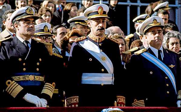 A colour photo of the Argentinean junta in pompous gala uniforms.