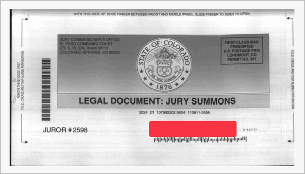 State of Colorado Legal Document - Jury Summons - showing an address blacked out, but not a barcode underneath the address