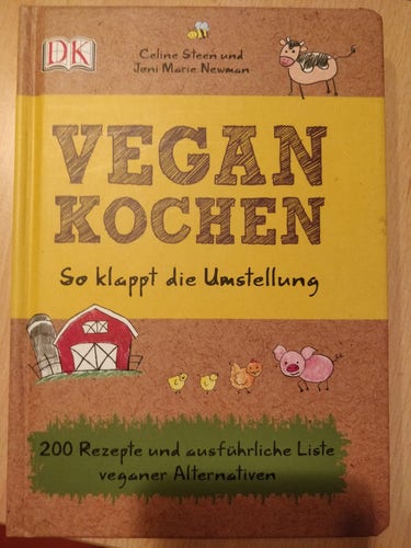 Photograph of a book cover (Title: "Vegan Kochen - so klappt die Umstellung", Authors: Celine Steen and Joni Marie Newman, Publisher: DK).