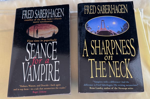 Paperback covers for two books by Fred Saberhagen, Seance for a Vampire and A Sharpness on the Neck