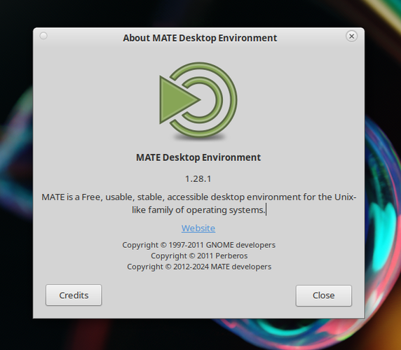 The "About" window in the MATE Desktop Environment showing the current version of 1.28.1, and underneath, the note of "MATE is a Free, usable, stable, accessible desktop environment for the Unix-like family of operating systems."