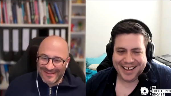 Decentered Podcast shot, showing Matthias and Sean laughing over a joke.