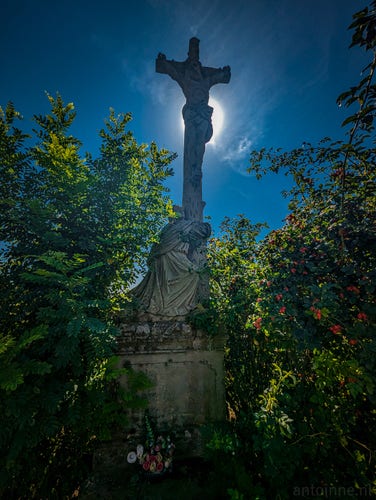 A statue of “Christ on the Cross, with Mary” near Rorschwihr, a commune in the Haut-Rhin department in Grand Est in north-eastern France.