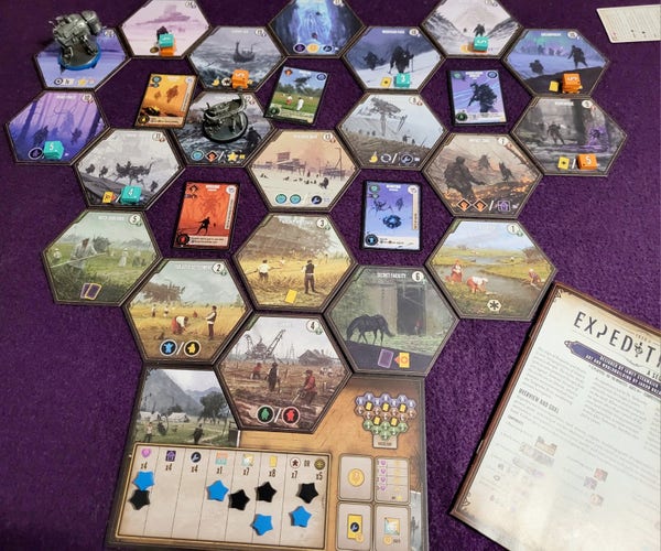Expeditions. The game consists of different hexagonal tiles where every player moves their figur (a mech) around