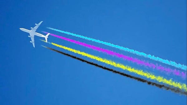 A photo of a jet streaking across the sky leaving four contrails behind it. They are cyan, magenta, yellow, and black in colour. Ink Jet.