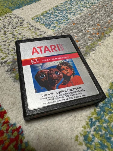 A copy the Atari 2600 game ET on a carpet. 