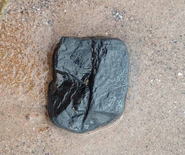 Your Christmas Present 😂
A lump of coal on the Sand 