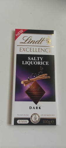 Photograph of a block of Lindt dark chocolate.  Salty liquorice flavour.
