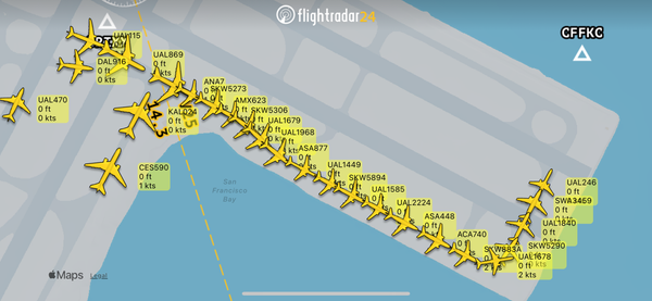 Screenshot of flightradar24 app showing dozens of aircraft in line waiting to depart SFO. 