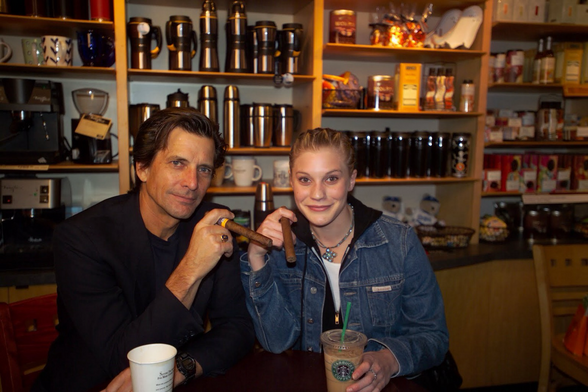 Both the actors who played the character Starbucks in the TV series Battlestar Galactica sit in a Starbucks coffee chain store.