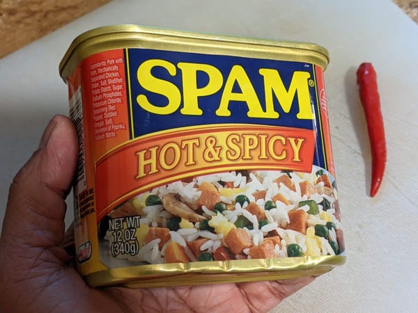 A can of spam with Hot & Spicy on the label