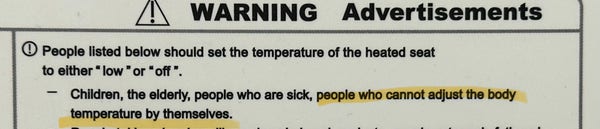 A section of a warning label advising certain individuals to set the temperature of a heated seat to "low" or "off," highlighting children, the elderly, people who are sick, and * people who cannot adjust their body temperature by themselves *