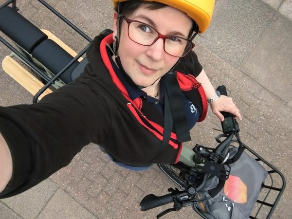 A selfie taken from above, not quite able to get the whole bike in, nose to tail. 